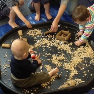 Halloween messy play with pumpkins in Newcastle.